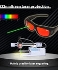 Heavy Duty Laser Safety Goggles Designed For Blue And Green Lasers Spanning 190 To 540 Nm Spectrum Ideal For Engraving Hustle While Keeping Your Peepers Locked In And Comfy All Day on display with laser engraving machine and green laser beam