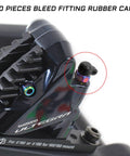 Close-up of hydraulic disc caliper with 10 Pack Bike Brake Bleeder Rubber Caps Dust Covers Bleed Screws Nipple Fittings installed.