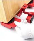 Ergonomic Furniture Lifter And Mover Tool Set With 4 Roller Pad Sliders shown lifting furniture with red sliders and lifting bar.