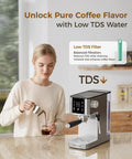 Woman pouring coffee from a semi automatic espresso machine with 20 bar pressure and built in activated carbon water filter.