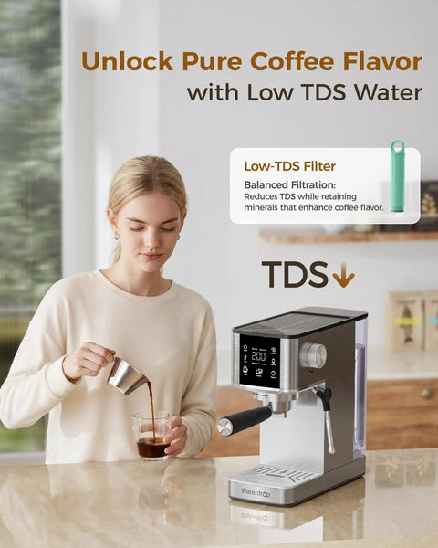 Woman pouring coffee from a semi automatic espresso machine with 20 bar pressure and built in activated carbon water filter.