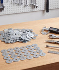 200 Piece Zinc Fender Washers 3/16 Inch By 1 1/4 Inch 2mm Thickness for Wood and Wet Environments displayed on a table