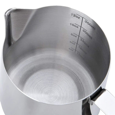 Interior view of stainless steel milk frothing pitcher with measurement markings, 12-ounce capacity, nonstick coated
