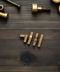 25 Pack Brass Cylindrical Barrel Hinges With Concealed Mount For Jewelry Boxes And Keepsake Boxes on wooden surface