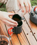 1.2L Camping Coffee Pot Set With Kettle, Mug And Percolator For Stove Top Brewing on wooden table