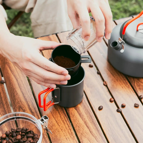 1.2L Camping Coffee Pot Set With Kettle, Mug And Percolator For Stove Top Brewing on wooden table