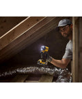 Man using Quiet 20V Max Quarter Inch Hydraulic Cordless Impact Driver With Brushless Motor LED Halo Ring XR Extreme Runtime Tool Only in attic