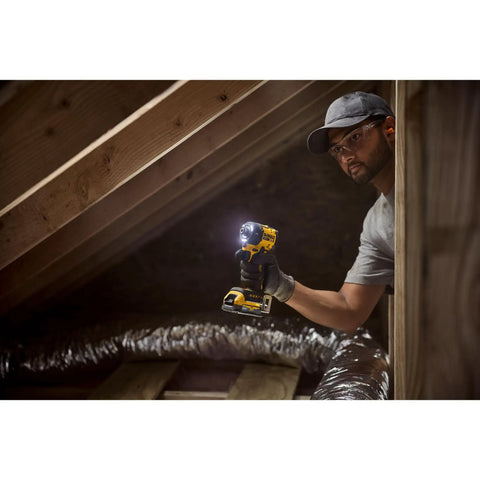 Man using Quiet 20V Max Quarter Inch Hydraulic Cordless Impact Driver With Brushless Motor LED Halo Ring XR Extreme Runtime Tool Only in attic