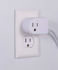 Braided Extension Cord With On Off Switch, 6 Ft Power Cable With 3 Prong Plug, Slip Resistant Base, Tabletop Or Wall Mountable, Tangle Free And Plug And Play Ready For Lamps And Holiday Lights, White And Gray 41095 plugged into wall outlet