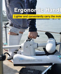 Heavy Duty Bow Mount Trolling Motor 80 Lbs Thrust 54 Inch Shaft 24V with ergonomic handle for convenient carrying.