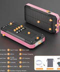 Outdoor Power Bank 33800mAh With Solar Charging And Super Bright LED Flashlight Portable Charger With Built In Cables Wireless Charging And Compass 7 Outputs 4 Inputs For Camping And Hiking in pink, showing features and components on a black background with user manual and accessories.