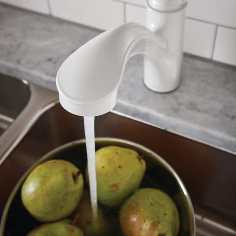 Brecklyn Glacier White One-Handle Single-Hole Kitchen Faucet With Pull-Out Sprayer Power Clean in use over pears