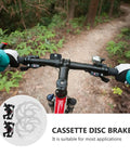 Complete Mechanical Disc Brake Set For Mountain Bikes Featuring Front And Rear 160 Mm Silver Aluminum Rotors with handlebars in a forest.