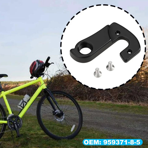 Two Pack Bike Derailleur Hanger With Screw 959371-8-5 Fits Norco Indie 2016 2019 next to yellow bike on path