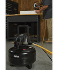 Portable 3 Gallon Air Compressor 0.3 HP 110 PSI Max Pressure Oil Free Pump in workshop for quick DIY tasks.