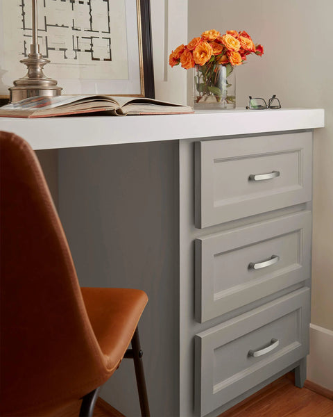 Contemporary Satin Nickel Cabinet Pull Rift Finish with Four and a Quarter Inch Overall Length installed on drawer handles in office.