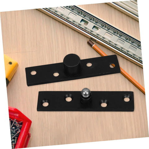 Heavy Duty Stainless Steel Pivot Hinge For Hidden Bookcases And Invisible Door Hardware With Rotatable Design For Secret Doors In Black Finish Durable For Cabinets And Commercial Spaces shown disassembled on a workbench