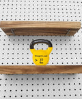 Pegboard Shelves With Lip For 14 By 4 Inch Peg Boards Three Pack shown supporting 22 lbs weight, installed on a pegboard.