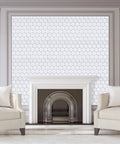 White 3D Hexagonal Peel And Stick Wall Tiles Set behind fireplace in living room