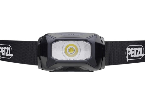 Tikkina Compact Headlamp with 300 Lumen Brightness for hiking, climbing, running, and camping, front view showing lens and strap.