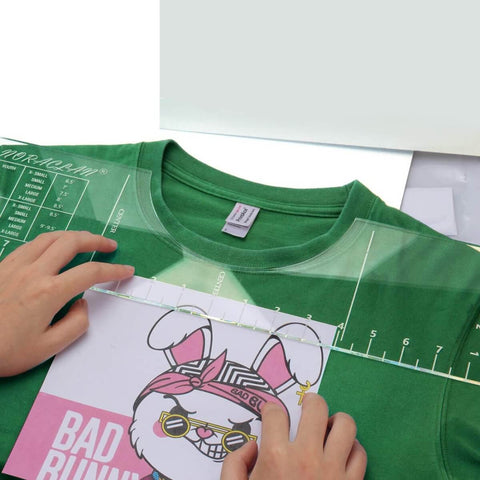 Pro T Shirt Ruler Guide For Easy Accurate Alignment Of Vinyl And Sublimation Designs On Shirts With Built In Size Chart For Hassle Free HTV Pressing And Perfect Placement Every Time on green T-shirt.