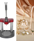 Watch Foot Replacement Tool Set With Welding And Bonding Kit for horology repair next to pearl jewelry on fabric background.