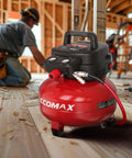 6 Gallon Pancake Air Compressor 150 PSI Portable Oil Free With 10 Piece Accessory Kit in a home workshop setting.