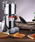 Pro Grade Electric Grain Grinder Mill High Speed Spice And Herb Grinder With 800g Capacity, on wooden surface with spices