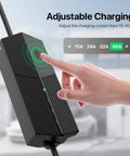 Person adjusting charging settings on 40 Amp Level 2 EV Charger With 50 Foot Mobile Cord For On The Go Home Charging