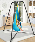 Child using Built Tough Swing Frame With Sensory Swing Pod Chair For Adults, X Shaped Indoor Outdoor Swing Set in a living room.