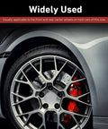 Slick Silver Wheel Center Caps Snap In Hub Covers For Cars And Suv on a stylish car wheel with red brake calipers.