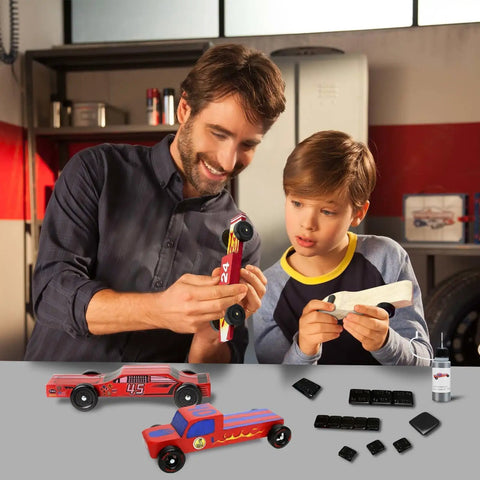 Father and son assembling Pinewood Derby cars with Pinewood Derby Weights Kit 5Oz With Tungsten Putty And 12 Derby Weights