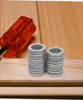 Built Tough Manganese Steel Wedge Locking Washers Heavy Duty Anti Loosening Hardware For Machinery And Construction Vibration Resistant Bolt Stabilizers assembled with a screwdriver on a wooden surface.