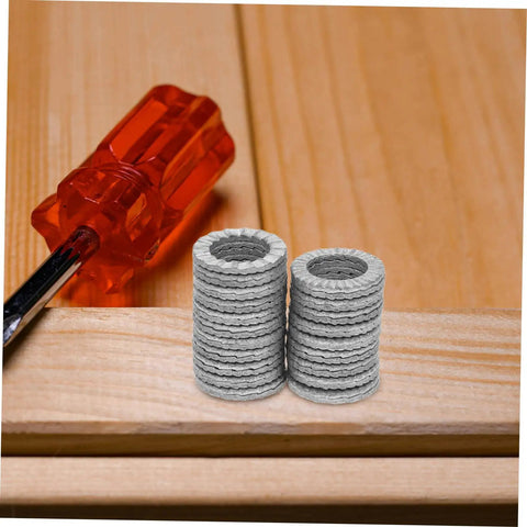 Built Tough Manganese Steel Wedge Locking Washers Heavy Duty Anti Loosening Hardware For Machinery And Construction Vibration Resistant Bolt Stabilizers assembled with a screwdriver on a wooden surface.