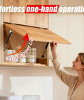 Person using 7 Inch 18 Lb Gas Struts For RV Cabinet Doors With Brackets Set Of 2 for easy lift and soft close of cabinet.