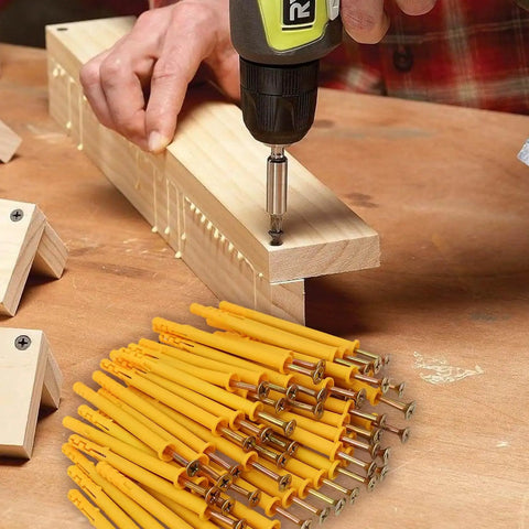 Person using a drill on wood with Built Like A Tank 50 Piece Concrete Drywall Anchor Set With Rock Solid Plastic Expansion Sleeves.