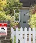 Straight Up Legal Deterrent Video Surveillance And No Trespassing Signs 4 Pack Aluminum Security Plates Weather Resistant red white sign on stone wall in garden