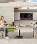 45lbs Beefy Heavy Duty Outdoor Umbrella Base For 1.2 To 2.2 Inch Poles, Steel Square Weighted Stand in use on patio
