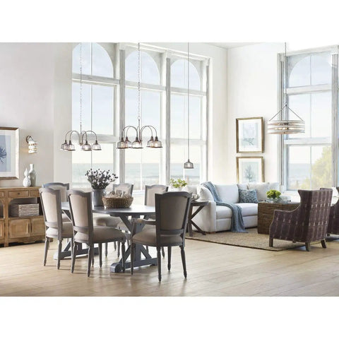 Spacious living room with modern lighting; features Gulliver Sconce Graphite Finish With Embossed Wood Grain Metal Banding Dual Tone.