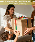 Family enjoying time together unwrapping a gift, emphasizing fun and connection, with Giant Wooden Tumbling Tower 5.3 Feet Tall With 60 Premium Pieces Total Blast Outdoor Stacking Game.