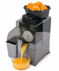 Heavy Duty Commercial Automatic Citrus Juicer Machine High Output Electric Orange Lemon Squeezer Extractor With Auto Pulp Separation Stainless Steel Fruit Press For Juice Bars And Restaurants pouring fresh juice into a bowl.