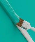 Slick Low Profile TV Wall Mount Cord Hider, Paintable Self Adhesive Cable Raceway For A No Sweat Install, Seamless Double Pack White Cover With Hidden Hinge For A Top Shelf Look showing a brush painting a white surface.