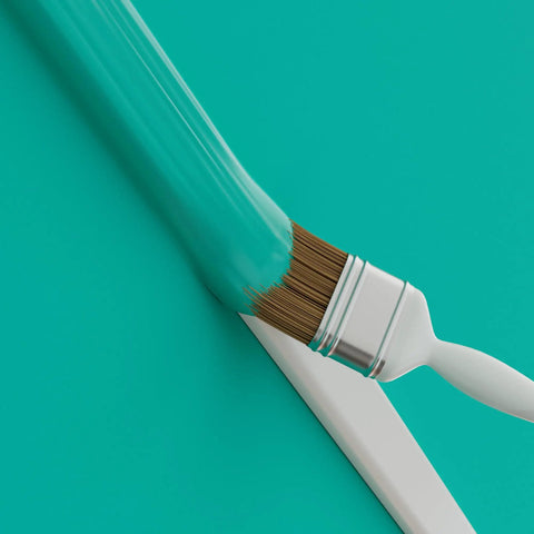 Slick Low Profile TV Wall Mount Cord Hider, Paintable Self Adhesive Cable Raceway For A No Sweat Install, Seamless Double Pack White Cover With Hidden Hinge For A Top Shelf Look showing a brush painting a white surface.
