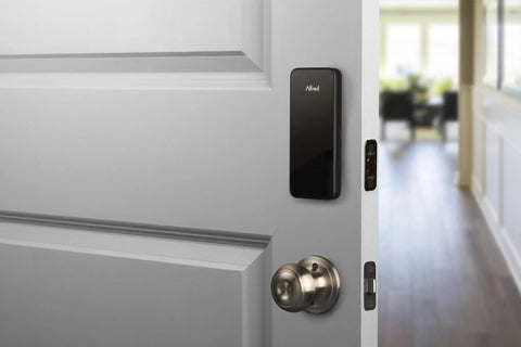 Touchscreen Smart Door Lock With Keypad And Bluetooth Motorized Deadbolt One Tap Entry Easy Setup Remote App Control See Who Entered And When 20 Unique Access Codes Black DB1 installed on a white door.