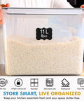 Person holding 11L airtight plastic container filled with rice. 2 Pack Extra Large Food Storage Containers With Lids 11L Each Easy Carry Handle BPA Free Airtight For Flour Sugar Rice Cereal Bulk Pantry Organization.