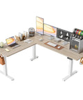 Dope Ergonomic L Shaped Standing Desk Adjustable Height Electric Sit Stand Corner Computer Workstation with light walnut finish.