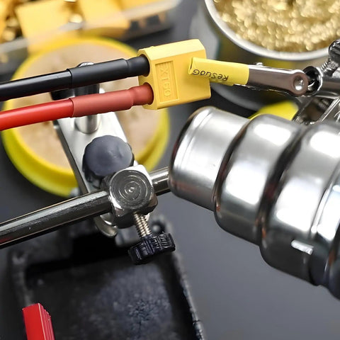 XT60 Connector Set With Heat Shrink Tubing, 5 Pairs, close-up of soldering process on high temp nylon housing male connector.