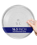 Hand holding 16.5 inch Replacement Microwave Glass Turntable Plate For Panasonic, Kenmore, And Sears, showing three notches