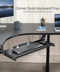Rock Solid Slide Out Keyboard Tray For Corner Desk Effortless Gliding Computer Drawer With Swivel Clamps Black mounted on L-shaped desk.