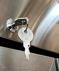 Key inserted into lock of Top Shelf Commercial 3 Door Reach In Refrigerator, Built Tough Stainless Steel Display Cooler.